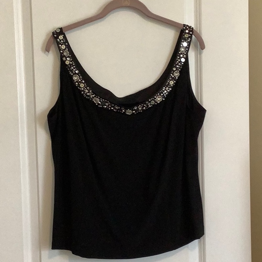 Black, two piece jacket and tank top.